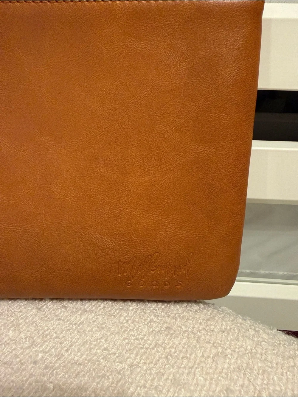 Milkmaid Goods camel colored wristlet clutch